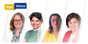 Four diverse women stand in front of a white background with the new voices logo above. 